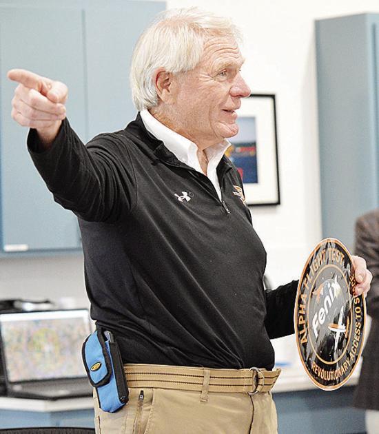 Fenix Space Safety Officer Dan Handlin shows off a decal during a presentation over the company’s concept design testing, which occurred at the Oklahoma Space Port in Burns Flat. CDN | Staff Photo Fenix Space Safety Officer Dan Handlin shows off a decal during a presentation over the company’s concept design testing, which occurred at the Oklahoma Space Port in Burns Flat. CDN | Staff Photo