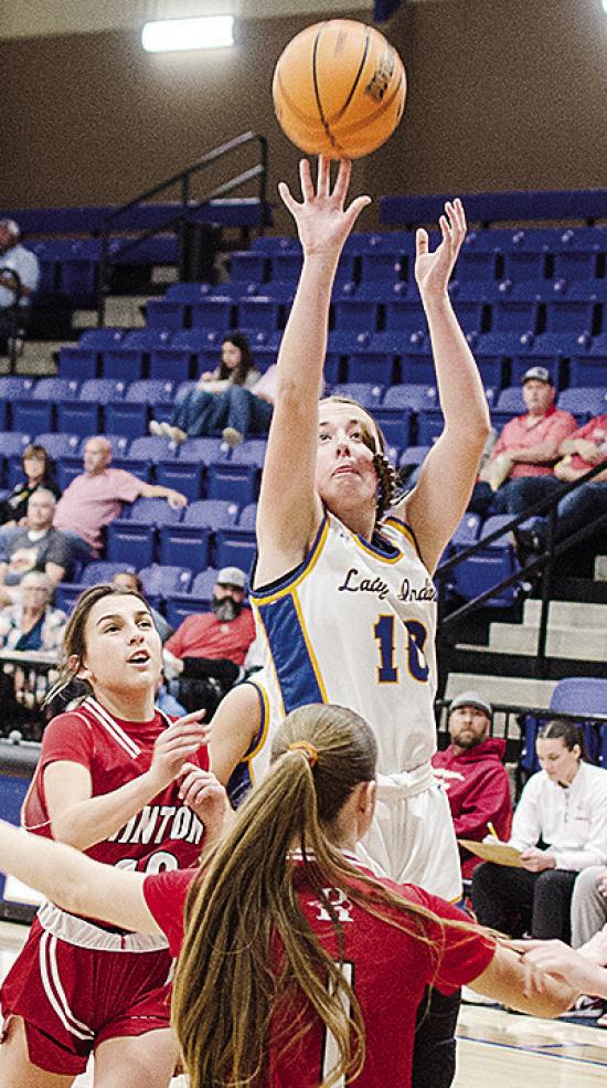 No. 10 Kelsey Garibay shoots over a Hinton defender during A-B’s one-sided win over the Lady Comets Tuesday at home. CDN | Sam Goodwyn