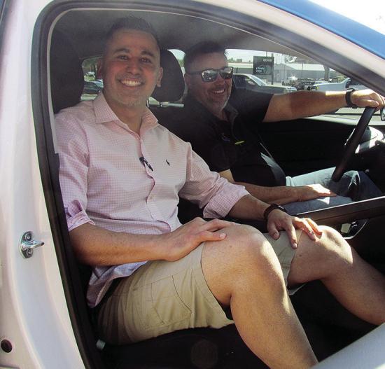 Jason Jackson, left, and Billy Goodwin sit in a 2025 Hyundai Elantra used at DriveSmart Academy 360 in Clinton. CDN | Christian Jacobsen