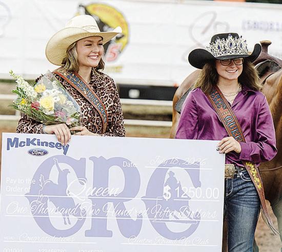 Ally Townsley, left, smiles after being award the 2026 Rodeo Queen Award from last year’s winner Tailee Finnell prior to the start of the rodeo Saturday at the Clinton Round-Up Club Arena. CDN | Sam Goodwyn Ally Townsley, left, smiles after being award the 2026 Rodeo Queen Award from last year’s winner Tailee Finnell prior to the start of the rodeo Saturday at the Clinton Round-Up Club Arena. CDN | Sam Goodwyn