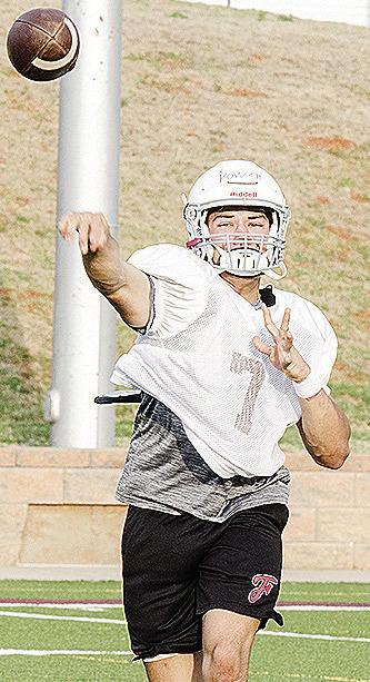 No. 7 Easten Powell throws the ball during a drill in the middle of practice Monday at the Tornado Bowl. CDN | Sam Goodwyn