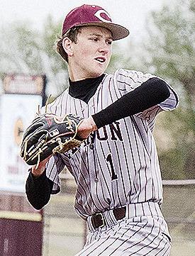 Clinton’s Jeter King goes into his wind up Friday as he prepares to pitch during the Reds’ home game against Kingfisher. CDN | Sam Goodwyn