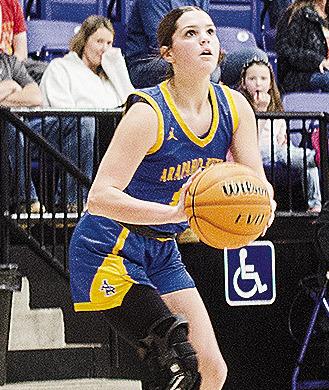 Arapaho-Butler’s Channing Cudd aims for the three-point shot during the championship game in the Western Equipment Classic against Cheyenne-Reydon. CDN | Sam Goodwyn