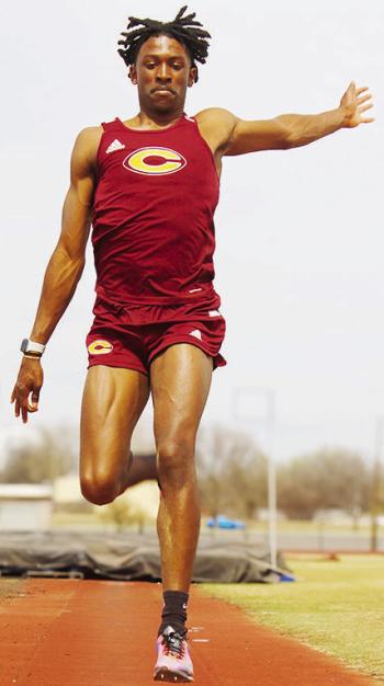 Recent Clinton graduate Atticus Thompson performs a long jump during a practice at the high school track and field course. CDN | Courtesy photo