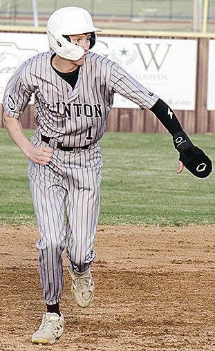 No. 1 Jeter King speeds toward third during Clinton’s win over Western Heights Tuesday at home. CDN | Sam Goodwyn