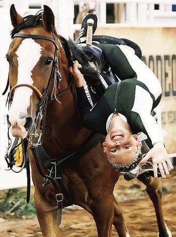 Emma Townsley performs a trick on her horse during the rodeo last year at the Clinton Roundup Club Areana. CDN | Courtesy photo