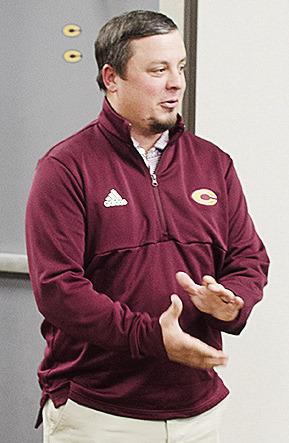 Newly hired Clinton head football coach Trevor Powers speaks with the Board of Education after being approved to take over the team during Monday’s meeting at the board office. CDN | Sam Goodwyn