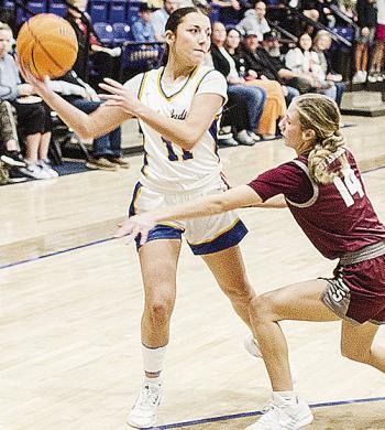 A-B’s Alivia Casas looks for an open teammate during the first round of the Western Equipment Classic against Sayre. CDN | Sam Goodwyn