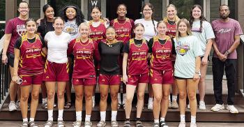 The Clinton Lady Reds basketball team comes together while in Broken Bow for a summer camp. Pictured in front, from left, are Emily De La Rosa, Paisley Ruyle, Laney Anderson, Ale-Jia Lacey, Hannah Miller, Sydney Pugh and Hadley Meget; back, Coach Ashley G