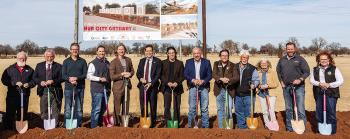 Pictured from left are Clinton City Manager Robert Johnston, Clinton Mayor David Berrong, West Oklahoma Co-Op executive committee member Luke Adams, State Rep. Anthony Moore, West Oklahoma Co-Op President Jason Smith, Lt. Gov. Matt Pinnell, designer and a