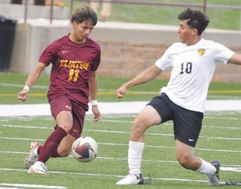 Clinton soccer survives and advances to second round