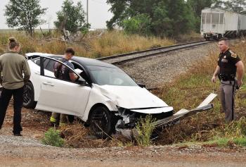 One woman and two children were believed to be the occupants of this vehicle that collided with a train just before 8 a.m. Wednesday morning on 1090 Road, just off U.S. Highway 183 in northern Washita County. They were allegedly taken by private vehicle t