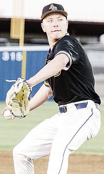 CDN | Sam Goodwyn Arapaho-Butler’s Jiles Southall goes into his wind up as he prepares to pitch during the Indians’ game against Fletcher during the spring season.