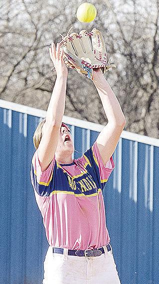 Arapaho-Butler’s Kelsey Garibay focuses on the ball as she reaches out to catch it for the out in the win against Seiling. CDN | Sam Goodwyn